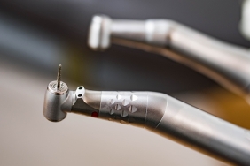 Macro view of dentist drill in clinic. Work tool of stomatologist for drilling a patient's teeth. Health and medicine concept. Close up.